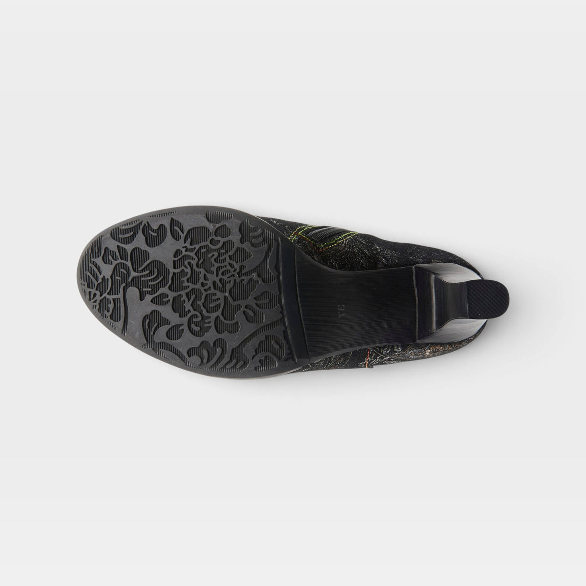 L'Artiste Smokinhot heeled booties in Black Multi, outsole view