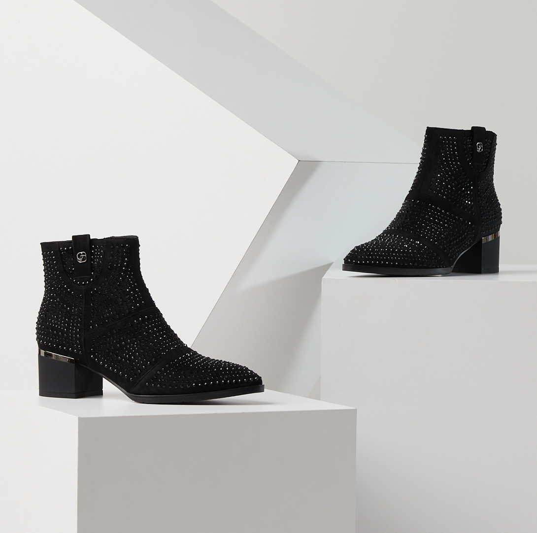 Azura Heavena women's bootie in black with microsuede upper and zipper detail